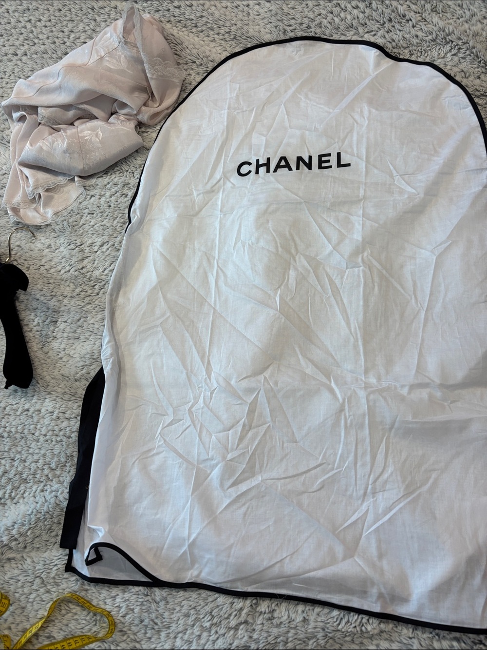 CHANEL White Garment Cover with Black Trim